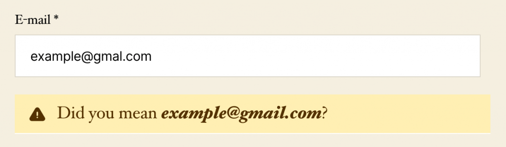 Example showing a user that entered an address ending in gmal.com and the validation error displaying that says "Did you mean gmail.com"